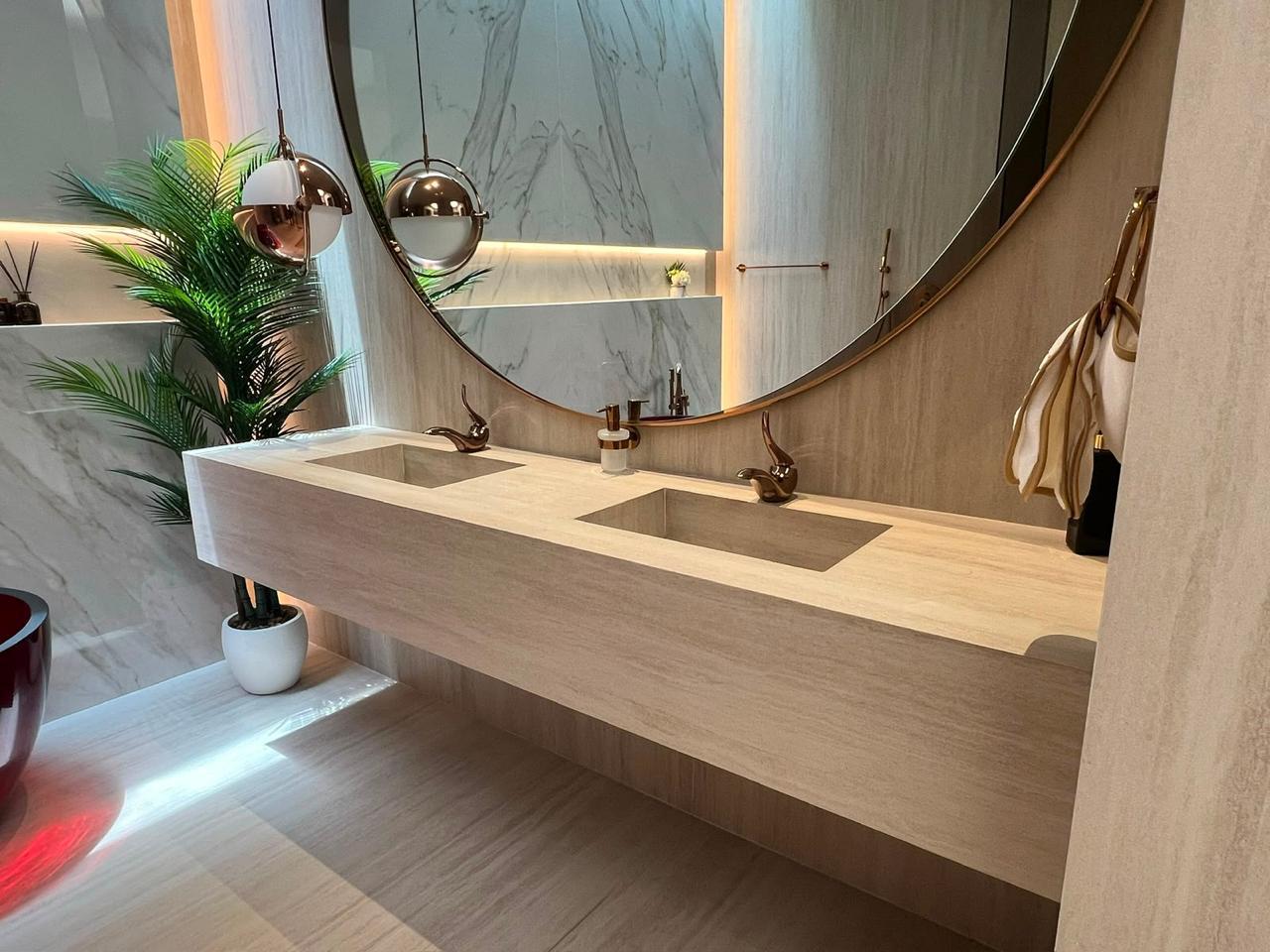 Luxury stone bathroom vanity and illuminated mirror