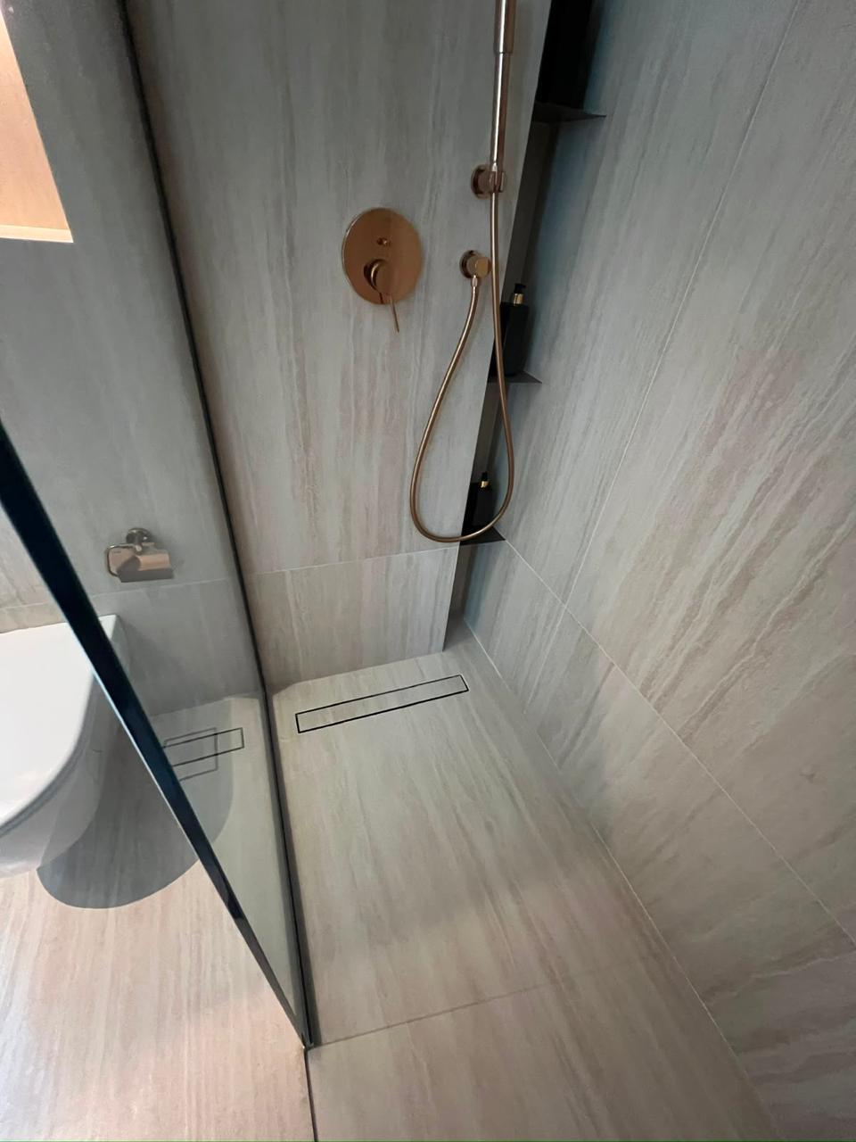 Precision tile and shower installation detail